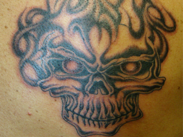 Black & White Flaming Skull Shoulder Tattoo