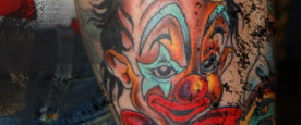 Colored Clowns on Forearm Tattoo