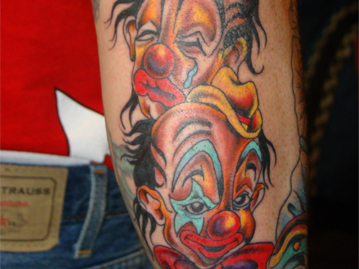 Colored Clowns on Forearm Tattoo