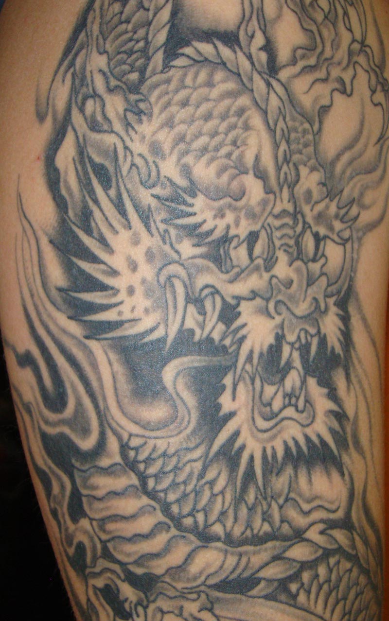 Half Arm Black And White Dragon Tattoo Completed At Nightwind Tattoo 
