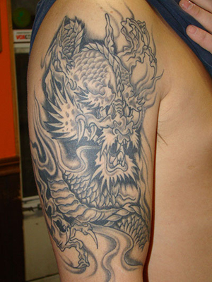 White Dragon Arm Tattoo