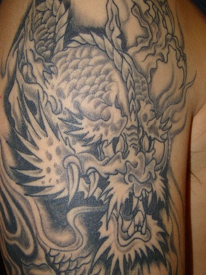 White Dragon Arm Tattoo