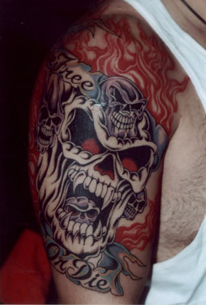 Full Color Flaming Skulls Tattoo