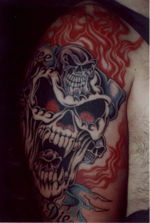 Full Color Flaming Skulls Tattoo