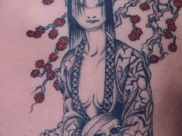 Japanese Girl Holding A Skull