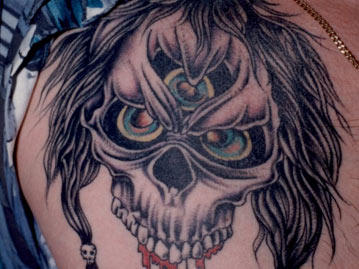Insane Three Eyed Skull Tattoo