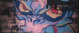 Vivid Red And Blue Evil Skull Tattoo